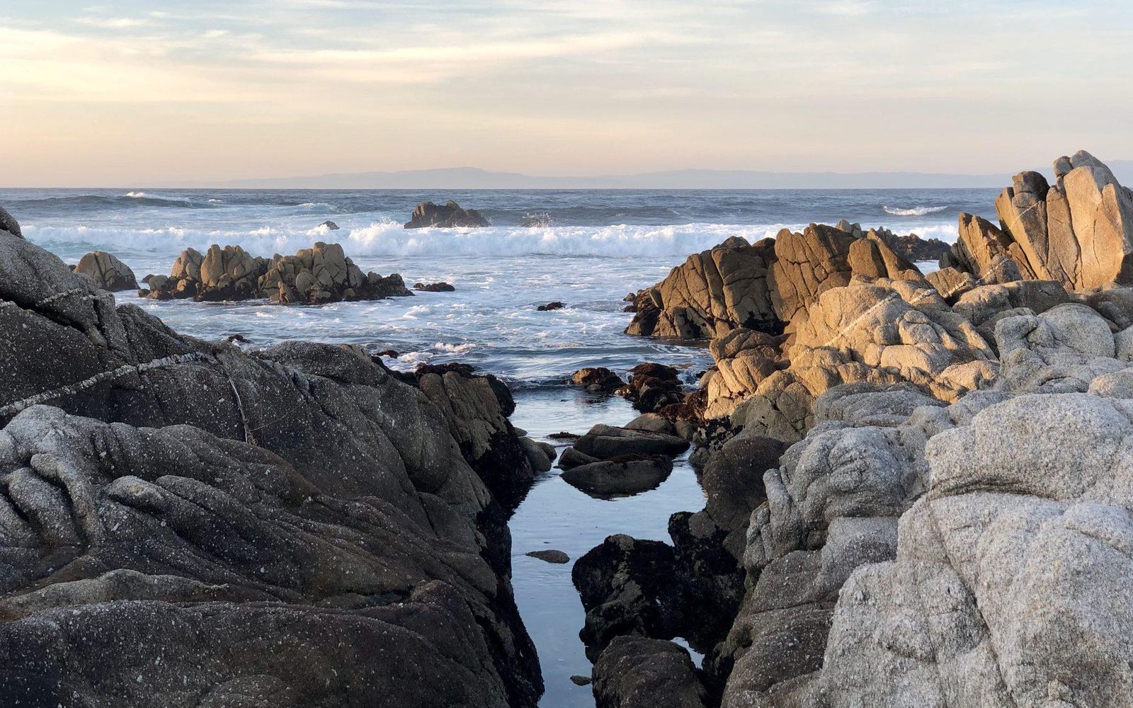 Granite and surf at dusk, Pacific Grove